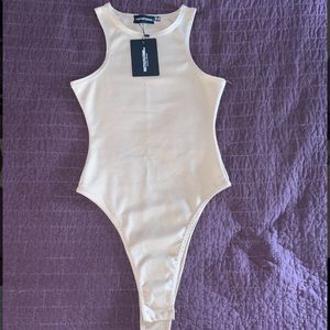 BRAND NEW, NEVER WORN BEFORE body suit.